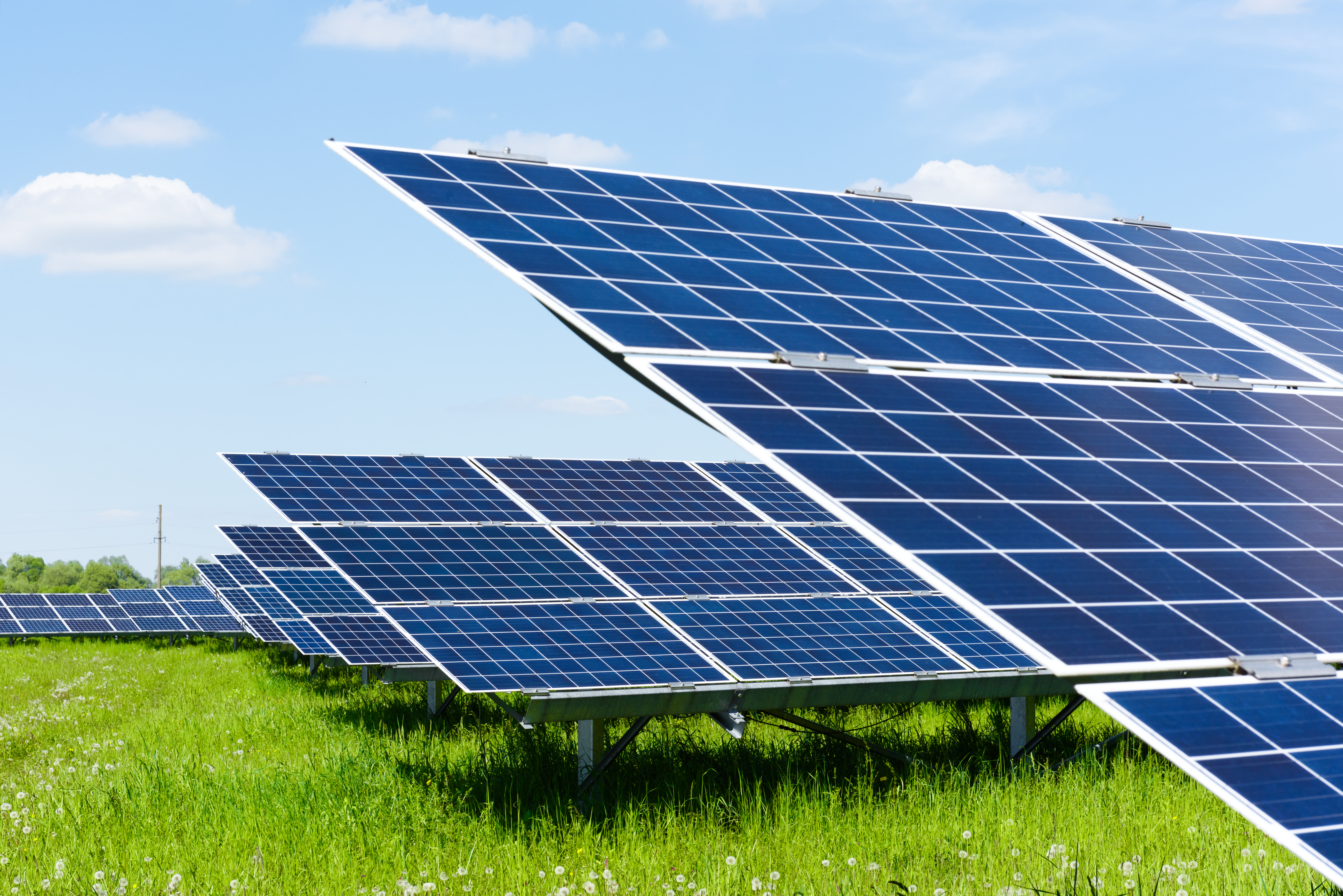 solar-panel-on-blue-sky-background